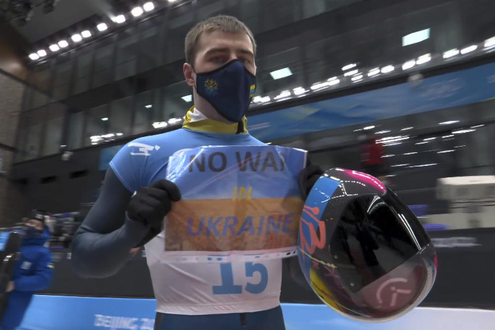 Olympian flashes‘No War in Ukraine’sign after competing