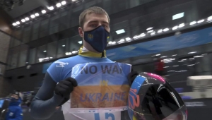 Olympian flashes‘No War in Ukraine’sign after competing