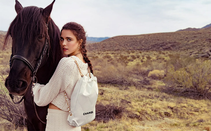 Margaret Qualley, Whitney Peak & Lily-Rose Depp Model CHANEL 22 Bag